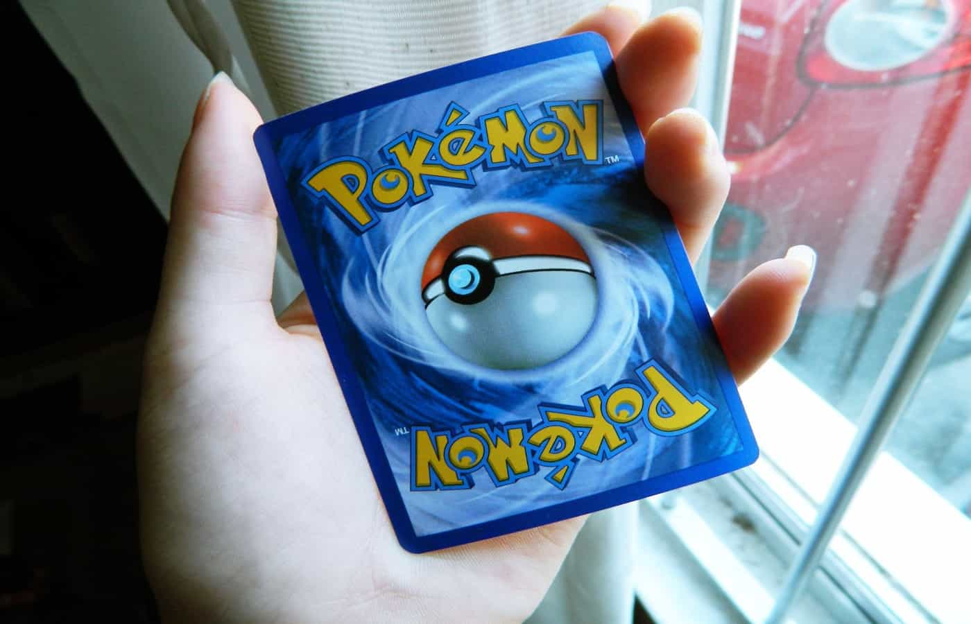 how to fix a bent pokemon card